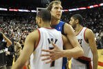 PORTLAND, OR - APRIL 28: Dirk Nowitzki #41 of the Dallas Mavericks hugs Brandon Roy #7 of the Portland Trail Blazers after Game Six of the Western Conference Quartefinals against the Portland Trail Blazers in the 2011 NBA Playsoffs on April 28, 2011 at the Rose garden in Portland, Oregon. The Mavericks won the game 103-96 to win the series and advance. NOTE TO USER: User expressly acknowledges and agrees that, by downloading and or using this photograph, User is consenting to the terms and conditions of the Getty Images License Agreement. (Photo by Steve Dykes/Getty Images)