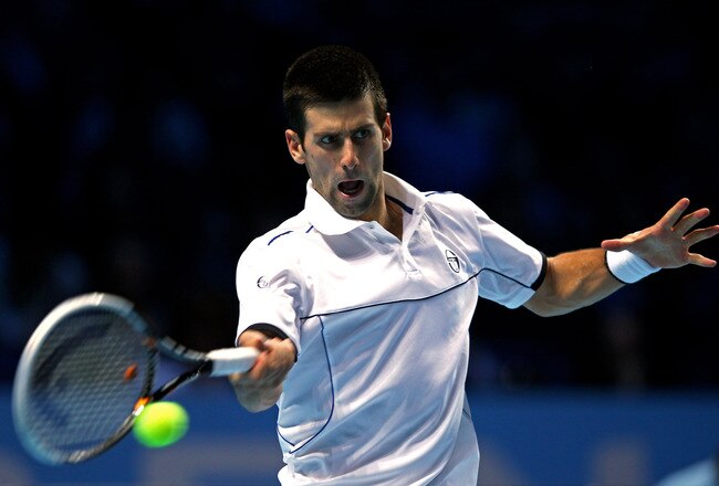 LONDON, ENGLAND - NOVEMBER 25:  Novak Djokovic of Serbia hits a forehand during the men's singles match against Janko Tipsarevic of Serbia during the Barclays ATP World Tour Finals at the O2 Arena on November 25, 2011 in London, England.  (Photo by Clive Brunskill/Getty Images)
