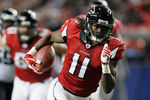 ATLANTA, GA - DECEMBER 15:  Julio Jones #11 of the Atlanta Falcons catches a 29-yard touchdown reception in the first quarter against the Jacksonville Jaguars at the Georgia Dome on December 15, 2011 in Atlanta, Georgia.  (Photo by Kevin C. Cox/Getty Images)
