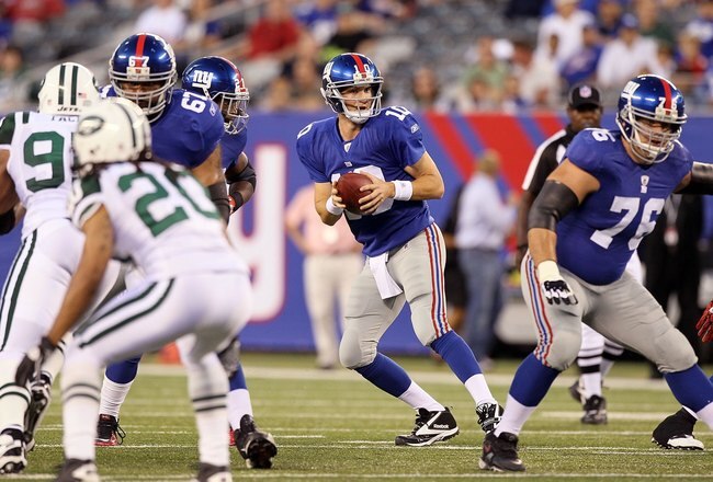 EAST RUTHERFORD, NJ - AUGUST 29:  Eli Manning #10 of the New York Giants in action against the New York Jets during their pre season game on August 29, 2011 at MetLife Stadium in East Rutherford, New Jersey.  (Photo by Jim McIsaac/Getty Images)
