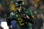 EUGENE, OR - DECEMBER 02:  LaMichael James #21 of the Oregon Ducks runs against the UCLA Bruins  during the Pac 12 Championship Game on December 2, 2011 at the Autzen Stadium in Eugene, Oregon.  (Photo by Jonathan Ferrey/Getty Images)