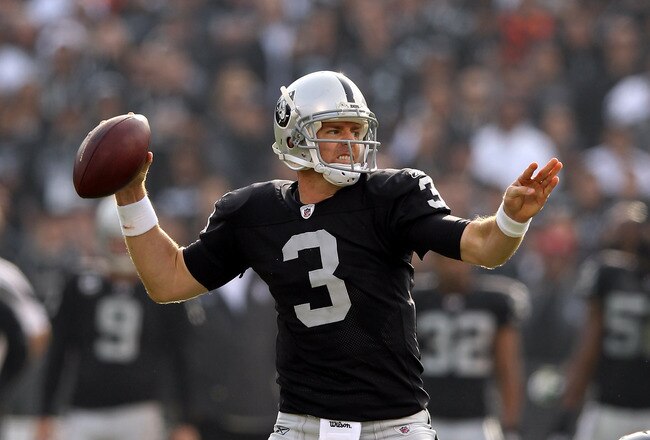 OAKLAND, CA - NOVEMBER 27:  Carson Palmer #3 of the Oakland Raiders throws the ball during their game against the Chicago Bears at O.co Coliseum on November 27, 2011 in Oakland, California.  (Photo by Ezra Shaw/Getty Images)