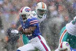 ORCHARD PARK, NY - DECEMBER 18: C.J. Spiller #28 of the Buffalo Bills runs against the Miami Dolphins  at Ralph Wilson Stadium  on December 18, 2011 in Orchard Park, New York.  (Photo by Rick Stewart/Getty Images)