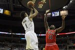 WASHINGTON, DC - FEBRUARY 28: Nick Young #1 of the Washington Wizards shoots over Ronnie Brewer #11 of the Chicago Bulls at the Verizon Center in Washington on February 28, 2011 in Washington, DC. NOTE TO USER: User expressly acknowledges and agrees that, by downloading and/or using this Photograph, User is consenting to the terms and conditions of the Getty Images License Agreement.  (Photo by Rob Carr/Getty Images)
