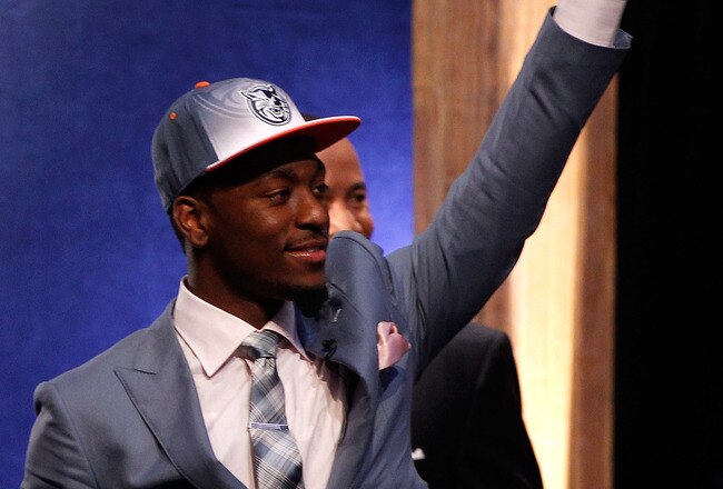 NEWARK, NJ - JUNE 23:  Kemba Walker from UCONN celebrates after he was selected #9 overall by the Charlotte Bobcats in the first round during the 2011 NBA Draft at the Prudential Center on June 23, 2011 in Newark, New Jersey.  NOTE TO USER: User expressly acknowledges and agrees that, by downloading and/or using this Photograph, user is consenting to the terms and conditions of the Getty Images License Agreement.  (Photo by Mike Stobe/Getty Images)