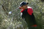 THOUSAND OAKS, CA - DECEMBER 04:  Tiger Woods hits his tee shot on the 13th hole during the final round of the Chevron World Challenge at Sherwood Country Club on December 4, 2011 in Thousand Oaks, California.  (Photo by Robert Meggers/Getty Images)