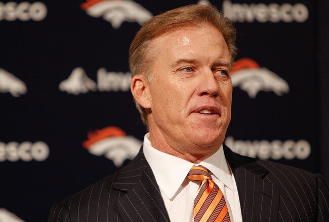 ENGLEWOOD, CO - JANUARY 14:  Denver Broncos vice president of football operations John Elway addresses the media during a press conference to announce John Fox as the next head coach at Dove Valley on January 14, 2011 in Englewood, Colorado. Fox was named the 14th head coach in Broncos history yesterday after spending the last nine seasons as head coach of the Carolina Panthers. (Photo by Justin Edmonds/Getty Images)