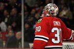 CHICAGO, IL - NOVEMBER 11: Ray Emery #30 of the Chicago Blackhawks spits water after giving up a goal to the Calgary Flames at the United Center on November 11, 2011 in Chicago, Illinois. The Blackhawks defeated the Flames 4-1. (Photo by Jonathan Daniel/Getty Images)
