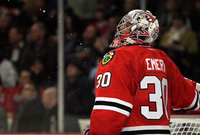 CHICAGO, IL - NOVEMBER 11: Ray Emery #30 of the Chicago Blackhawks spits water after giving up a goal to the Calgary Flames at the United Center on November 11, 2011 in Chicago, Illinois. The Blackhawks defeated the Flames 4-1. (Photo by Jonathan Daniel/Getty Images)
