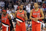 DALLAS, TX - APRIL 19:  (L-R) Gerald Wallace #3, LaMarcus Aldridge #12 and Marcus Camby #23 of the Portland Trail Blazers during a loss against the Dallas Mavericks in Game Two of the Western Conference Quarterfinals during the 2011 NBA Playoffs on April 19, 2011 at American Airlines Center in Dallas, Texas.  NOTE TO USER: User expressly acknowledges and agrees that, by downloading and or using this photograph, User is consenting to the terms and conditions of the Getty Images License Agreement.  (Photo by Ronald Martinez/Getty Images)