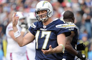 SAN DIEGO, CA - DECEMBER 11:  Philip Rivers #17 of the San Diego Chargers reacts after his fumble resulting in a touchdown to Bryan Scott #43 of the Buffalo Bills at Qualcomm Stadium on December 11, 2011 in San Diego, California.  (Photo by Harry How/Getty Images)