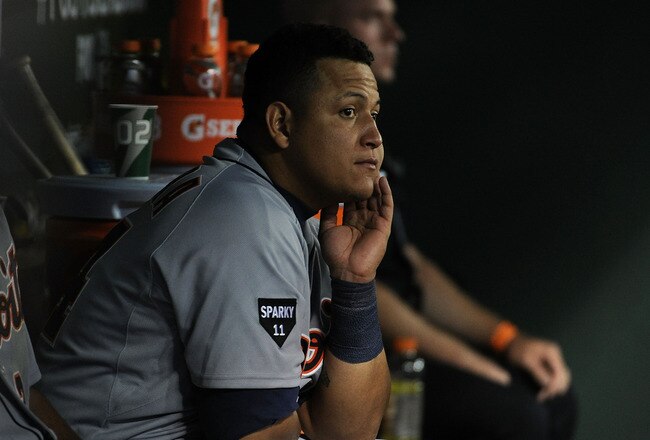 ARLINGTON, TX - OCTOBER 15:  Miguel Cabrera #24 of the Detroit Tigers sits on the bench during Game Six of the American League Championship Series against the Texas Rangers at Rangers Ballpark in Arlington on October 15, 2011 in Arlington, Texas.  (Photo by Harry How/Getty Images)