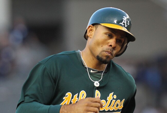NEW YORK, NY - AUGUST 24:  Coco Crisp #4 of the Oakland Athletics rounds the bases after his first inning solo home run against the New York Yankees on August 24, 2011 at Yankee Stadium in the Bronx borough of New York City.  (Photo by Nick Laham/Getty Images)