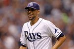 ST. PETERSBURG - OCTOBER 03:  Pitcher David Price #14 of the Tampa Bay Rays smiles as he walks back to the dugout against the Texas Rangers during Game Three of the American League Division Series at Tropicana Field on October 3, 2011 in St. Petersburg, Florida.  (Photo by J. Meric/Getty Images)