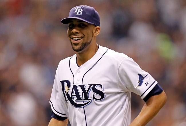 ST. PETERSBURG - OCTOBER 03:  Pitcher David Price #14 of the Tampa Bay Rays smiles as he walks back to the dugout against the Texas Rangers during Game Three of the American League Division Series at Tropicana Field on October 3, 2011 in St. Petersburg, Florida.  (Photo by J. Meric/Getty Images)