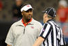 NEW ORLEANS, LA - NOVEMBER 10:  Kevin Sumlin, head coach of the University of Houston Cougars discusses a call with an official during a game against the Tulane Green Wave being held at the Mercedes-Benz Superdome on November 10, 2011 in New Orleans, Louisiana.  (Photo by Stacy Revere/Getty Images)