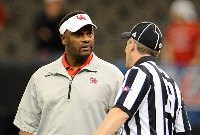 NEW ORLEANS, LA - NOVEMBER 10:  Kevin Sumlin, head coach of the University of Houston Cougars discusses a call with an official during a game against the Tulane Green Wave being held at the Mercedes-Benz Superdome on November 10, 2011 in New Orleans, Louisiana.  (Photo by Stacy Revere/Getty Images)