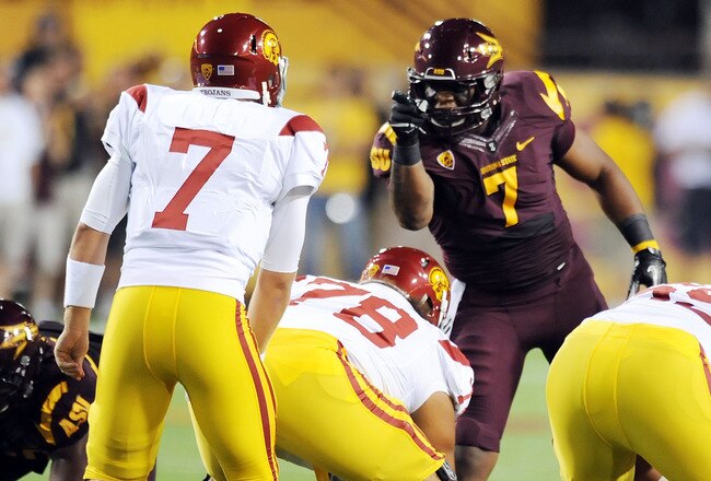 TEMPE, AZ - SEPTEMBER 24:   Vontaze Burfict #7 of the Arizona State Sun Devils points and yells at quarterback Matt Barkley #7 of the University of Southern California Trojans just prior to a play at Sun Devil Stadium on September 24, 2011 in Tempe, Arizona.  (Photo by Norm Hall/Getty Images)