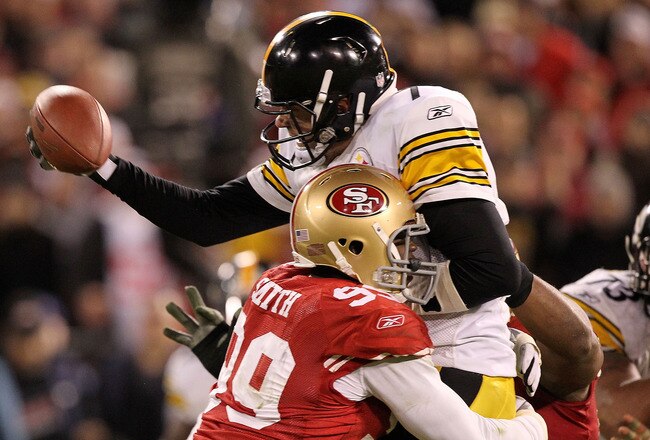 SAN FRANCISCO, CA - DECEMBER 19:  Quarterback Ben Roethlisberger #7 of the Pittsburgh Steelers is hit by lineback Aldon Smith #99 of the San Francisco 49ers during the game at Candlestick Park on December 19, 2011 in San Francisco, California.  Roethlisberger fumbled on the play. (Photo by Karl Walter/Getty Images)