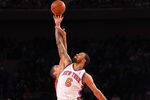 NEW YORK, NY - DECEMBER 21:  Tyson Chandler #6 of the New York Knicks and Brook Lopez #11 of the New Jersey Nets jump for the ball during their pre season game  at Madison Square Garden on December 21, 2011 in New York City.  NOTE TO USER: User expressly acknowledges and agrees that, by downloading and or using this photograph, User is consenting to the terms and conditions of the Getty Images License Agreement. (Photo by Al Bello/Getty Images)