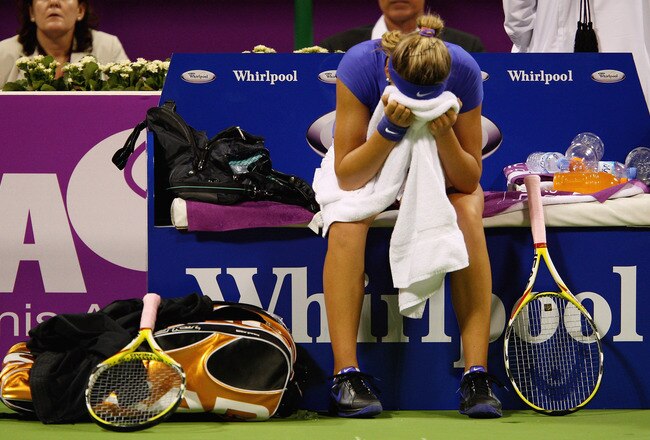 DOHA, QATAR - OCTOBER 28:  Victoria Azarenka of Belarus shows her frustration against Caroline Wozniacki of Denmark in their round robin match during the Sony Ericsson Championships at the Khalifa Tennis and Squash Complex on October 28, 2009 in Doha, Qatar.  (Photo by Clive Brunskill/Getty Images)