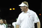 TUCSON, AZ - SEPTEMBER 24:  Head coach Mike Stoops of the Arizona Wildcats reacts to an official after Austin Hill (not pictured) was injured during the thrid quarter of the college football game against the Oregon Ducks at Arizona Stadium on September 24, 2011 in Tucson, Arizona.  The Ducks defeated the Wildcats 56-31.  (Photo by Christian Petersen/Getty Images)