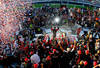 DAYTONA BEACH, FL - FEBRUARY 20:  Trevor Bayne, driver of the #21 Motorcraft/Quick Lane Ford, celebrates in Victory Lane after winning the NASCAR Sprint Cup Series Daytona 500 at Daytona International Speedway on February 20, 2011 in Daytona Beach, Florida.  (Photo by Matthew Stockman/Getty Images for NASCAR)
