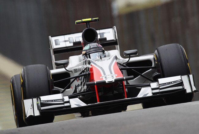SAO PAULO, BRAZIL - NOVEMBER 26:  Vitantonio Liuzzi of Italy and Hispania Racing Team drives during qualifying for the Brazilian Formula One Grand Prix at the Autodromo Jose Carlos Pace on November 26, 2011 in Sao Paulo, Brazil.  (Photo by Mark Thompson/Getty Images)