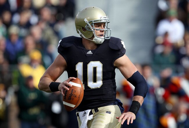 SOUTH BEND, IN - OCTOBER 30: Dayne Crist #10 of the Notre Dame Fighting Irish looks for a receiver against the Tulsa Golden Hurricane at Notre Dame Stadium on October 30, 2010 in South Bend, Indiana. Tulsa defeated Notre Dame 28-27. (Photo by Jonathan Daniel/Getty Images)