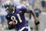 BALTIMORE, MD - AUGUST 06:  Anquan Boldin #81 of the Baltimore Ravens carries the ball during training camp at M&T Bank Stadium on August 6, 2011 in Baltimore, Maryland.  (Photo by Rob Carr/Getty Images)