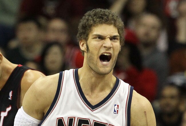 NEWARK, NJ - APRIL 03:  Brook Lopez #11 of the New Jersey Nets reacts against the Miami Heat at the Prudential Center on April 3, 2011 in Newark, New Jersey.The Heat defeated the Nets 108-94.NOTE TO USER: User expressly acknowledges and agrees that, by downloading and/or using this Photograph, user is consenting to the terms and conditions of the Getty Images License Agreement.  (Photo by Jim McIsaac/Getty Images)