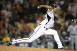 LOS ANGELES - MARCH 22: Yu Darvish #11 of Japan delivers a pitch against the United States in the semifinal game of the 2009 World Baseball Classic on March 22, 2009 at Dodger Stadium in Los Angeles, California. (Photo by Stephen Dunn/Getty Images)