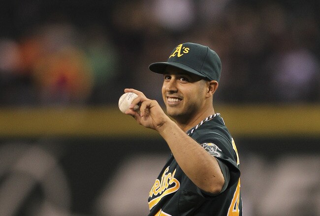 SEATTLE - SEPTEMBER 28:  Starting pitcher Gio Gonzalez #47 of the Oakland Athletics smiles after spearing a line drive off the bat of Kyle Seager of the Seattle Mariners in the fifth inning at Safeco Field on September 28, 2011 in Seattle, Washington. (Photo by Otto Greule Jr/Getty Images)