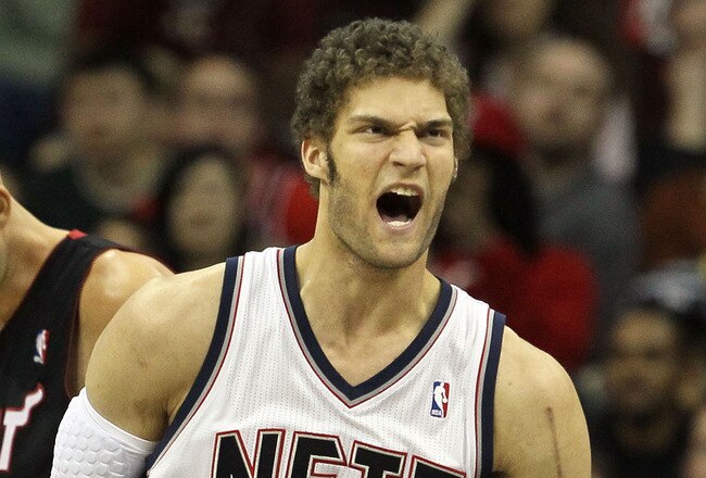 NEWARK, NJ - APRIL 03:  Brook Lopez #11 of the New Jersey Nets reacts against the Miami Heat at the Prudential Center on April 3, 2011 in Newark, New Jersey.The Heat defeated the Nets 108-94.NOTE TO USER: User expressly acknowledges and agrees that, by downloading and/or using this Photograph, user is consenting to the terms and conditions of the Getty Images License Agreement.  (Photo by Jim McIsaac/Getty Images)