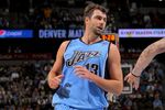 DENVER - OCTOBER 28:  Mehmet Okur #13 of the Utah Jazz heads down court against the Denver Nuggets during NBA action at Pepsi Center on October 28, 2009 in Denver, Colorado. The Nuggets defeated the Jazz 114-105.  (Photo by Doug Pensinger/Getty Images)