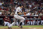 PHOENIX, AZ - SEPTEMBER 25:  Carlos Beltran #15 of the San Francisco Giants bats against the Arizona Diamondbacks during the Major League Baseball game at Chase Field on September 25, 2011 in Phoenix, Arizona.  (Photo by Christian Petersen/Getty Images)