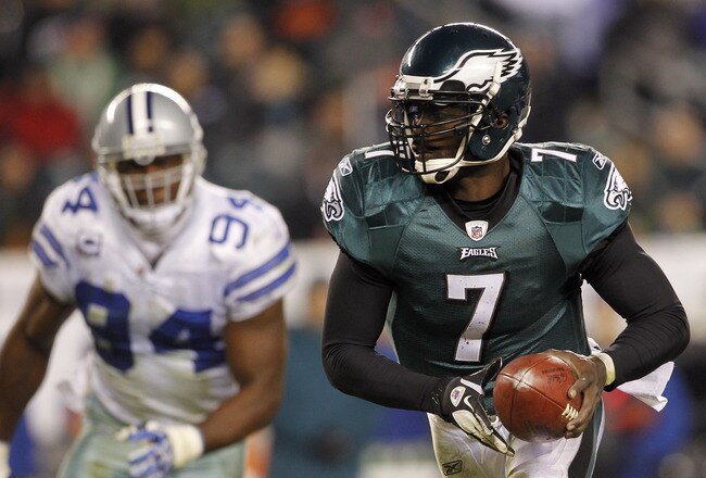 PHILADELPHIA, PA - OCTOBER 30: Michael Vick #7 of the Philadelphia Eagles looks to run as DeMarcus Ware #94 the Dallas Cowboys is in pursuit during a game at Lincoln Financial Field on October 30, 2011 in Philadelphia, Pennsylvania. (Photo by Rich Schultz /Getty Images)