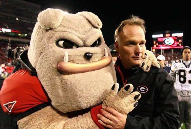 ATHENS, GA - NOVEMBER 27:  Head coach Mark Richt and Hairy, mascot of the Georgia Bulldogs, celebrate their 42-34 win over the Georgia Tech Yellow Jackets at Sanford Stadium on November 27, 2010 in Athens, Georgia.  (Photo by Kevin C. Cox/Getty Images)