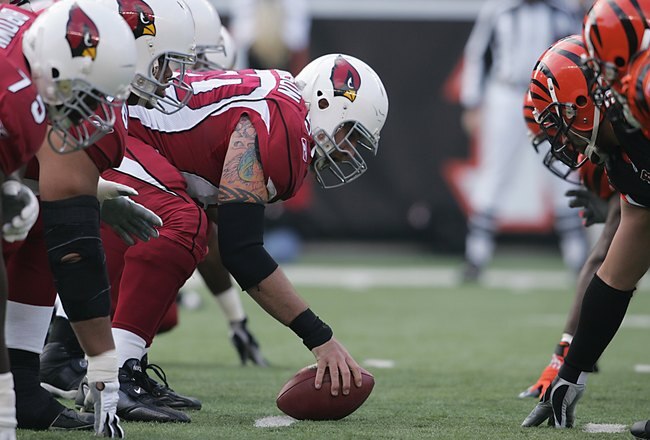CINCINNATI - NOVEMBER 18:  Al Johnson #50 of the Arizona Cardinals crouches into position at the line of scrimmage during the NFL game against the Cincinnati Bengals at Paul Brown Stadium on November 18, 2007 in Cincinnati, Ohio. (Photo by Andy Lyons/Getty Images)