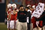 SAN DIEGO - DECEMBER 30:  Defensive Coordinator Carl Pelini of the University of Nebraska Cornhuskers looks on from the sideline during the Pacific Life Holiday Bowl against University of Arizona Wildcats on December 30, 2009 at Qualcomm Stadium in San Diego, California. The Cornhuskers defeated the Wildcats 33-0. (Photo By Donald Miralle/Getty Images)