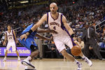 PHOENIX, AZ - MARCH 27:  Marcin Gortat #4 of the Phoenix Suns drives the ball during the NBA game against the Dallas Mavericks at US Airways Center on March 27, 2011 in Phoenix, Arizona.  NOTE TO USER: User expressly acknowledges and agrees that, by downloading and or using this photograph, User is consenting to the terms and conditions of the Getty Images License Agreement.  (Photo by Christian Petersen/Getty Images)