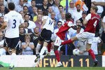 LONDON, ENGLAND - OCTOBER 02:  Rafael Van der Vaart of Tottenham Hotspur (C) scores the opening goal past the challenges of Bacary Sagna and Per Mertesacker of Arsenal during the Barclays Premier League match between Tottenham Hotspur and Arsenal at White Hart Lane on October 2, 2011 in London, England.  (Photo by Julian Finney/Getty Images)