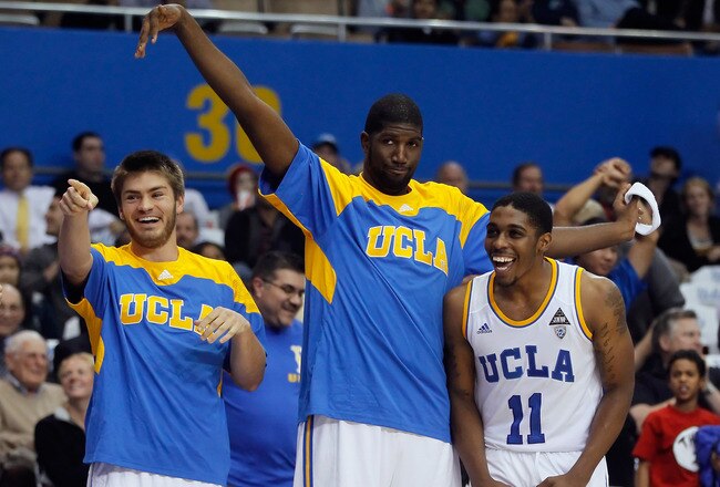 LOS ANGELES, CA - DECEMBER 20:  (L-R) Matt DeMarcus #13, Anthony Stover #0 and Lazeric Jones #11 of the UCLA Bruins celebrate on the bench against the UC Irvine Anteaters in the second half at LA Sports Arena on December 20, 2011 in Los Angeles, California. UCLA defeated UC-Irvine 89-60.  (Photo by Jeff Gross/Getty Images)