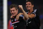 NAPLES, ITALY - OCTOBER 18:  Toni Kroos (L) with his teammate Mario Gomez of FC Bayern Muenchen celebrates after scoring the opening goal  during the UEFA Champions League Group A match between SSC Napoli and FC Bayern Muenchen at Stadio San Paolo on October 18, 2011 in Naples, Italy.  (Photo by Paolo Bruno/Getty Images)