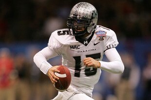 NEW ORLEANS - JANUARY 01:  Quarterback Colt Brennan #15 of the Hawai'i Warriors rolls out of the pocket against the Georgia Bulldogs during the Allstate Sugar Bowl at the Louisiana Superdome on January 1, 2008 in New Orleans, Louisiana.  (Photo by Matthew Stockman/Getty Images)