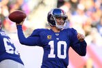 EAST RUTHERFORD, NJ - DECEMBER 18:  Eli Manning #10 of the New York Giants passes against the Washington Redskins during their game at MetLife Stadium on December 18, 2011 in East Rutherford, New Jersey.  (Photo by Al Bello/Getty Images)