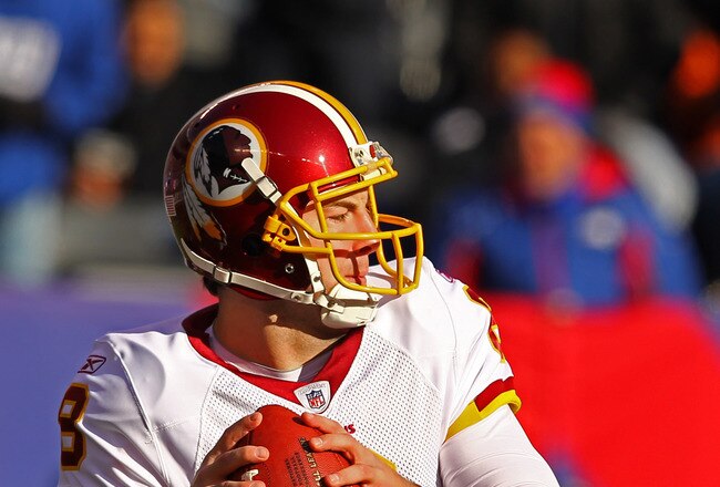 EAST RUTHERFORD, NJ - DECEMBER 18:   Rex Grossman #8 of the Washington Redskins passes against the New York Giants during their game at MetLife Stadium on December 18, 2011 in East Rutherford, New Jersey.  (Photo by Al Bello/Getty Images)
