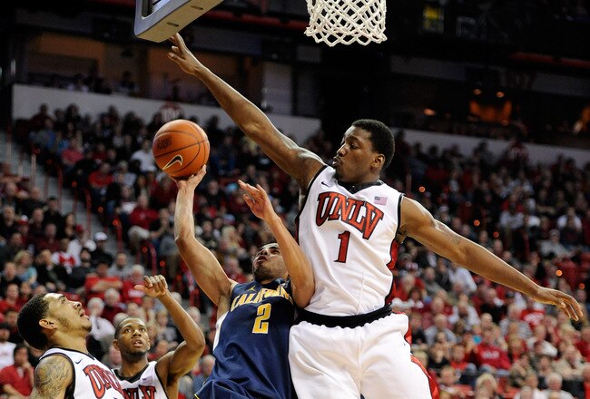 LAS VEGAS, NV - DECEMBER 23:  Jorge Gutierrez #2 of the California Golden Bears is fouled by Quintrell Thomas #1 of the UNLV Rebels as Anthony Marshall (L) #3 and Mike Moser #43 of UNLV look on during their game at the Thomas & Mack Center December 23, 2011 in Las Vegas, Nevada. UNLV won 85-68.  (Photo by Ethan Miller/Getty Images)