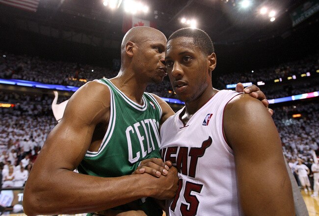 MIAMI, FL - MAY 11: Mario Chalmers #15 of the Miami Heat is congratulated by Ray Allen #20 of the Boston Celtics after Game Five of the Eastern Conference Semifinals of the 2011 NBA Playoffs at American Airlines Arena on May 11, 2011 in Miami, Florida. NOTE TO USER: User expressly acknowledges and agrees that, by downloading and/or using this Photograph, User is consenting to the terms and conditions of the Getty Images License Agreement.  (Photo by Mike Ehrmann/Getty Images)