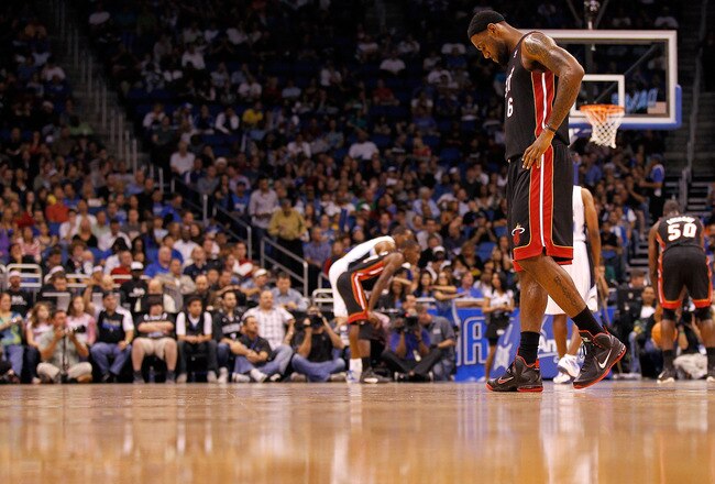 ORLANDO, FL - DECEMBER 21:  LeBron James #6 of the Miami Heat looks on during a preseason game against the Orlando Magic at Amway Center on December 21, 2011 in Orlando, Florida. NOTE TO USER: User expressly acknowledges and agrees that, by downloading and/or using this Photograph, User is consenting to the terms and conditions of the Getty Images License Agreement.  (Photo by Mike Ehrmann/Getty Images)